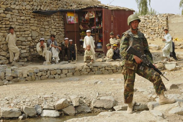 An afghan army soldier on foot patrol