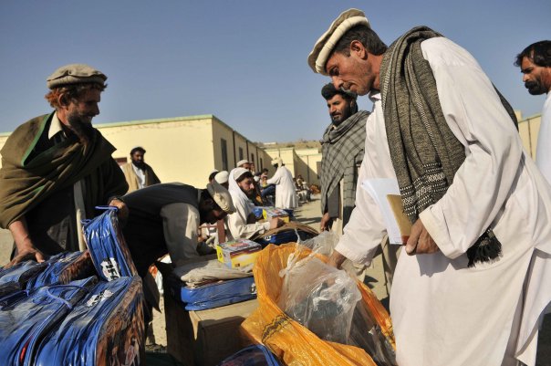 Locals distributing blankets and jackets in prepar
